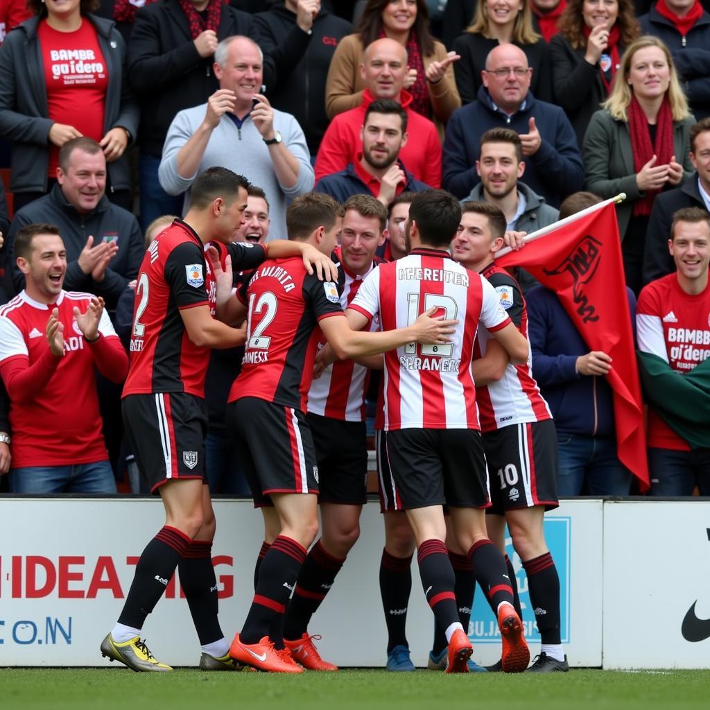 Passionate fans of Ashton United and Bamber Bridge celebrate a goal