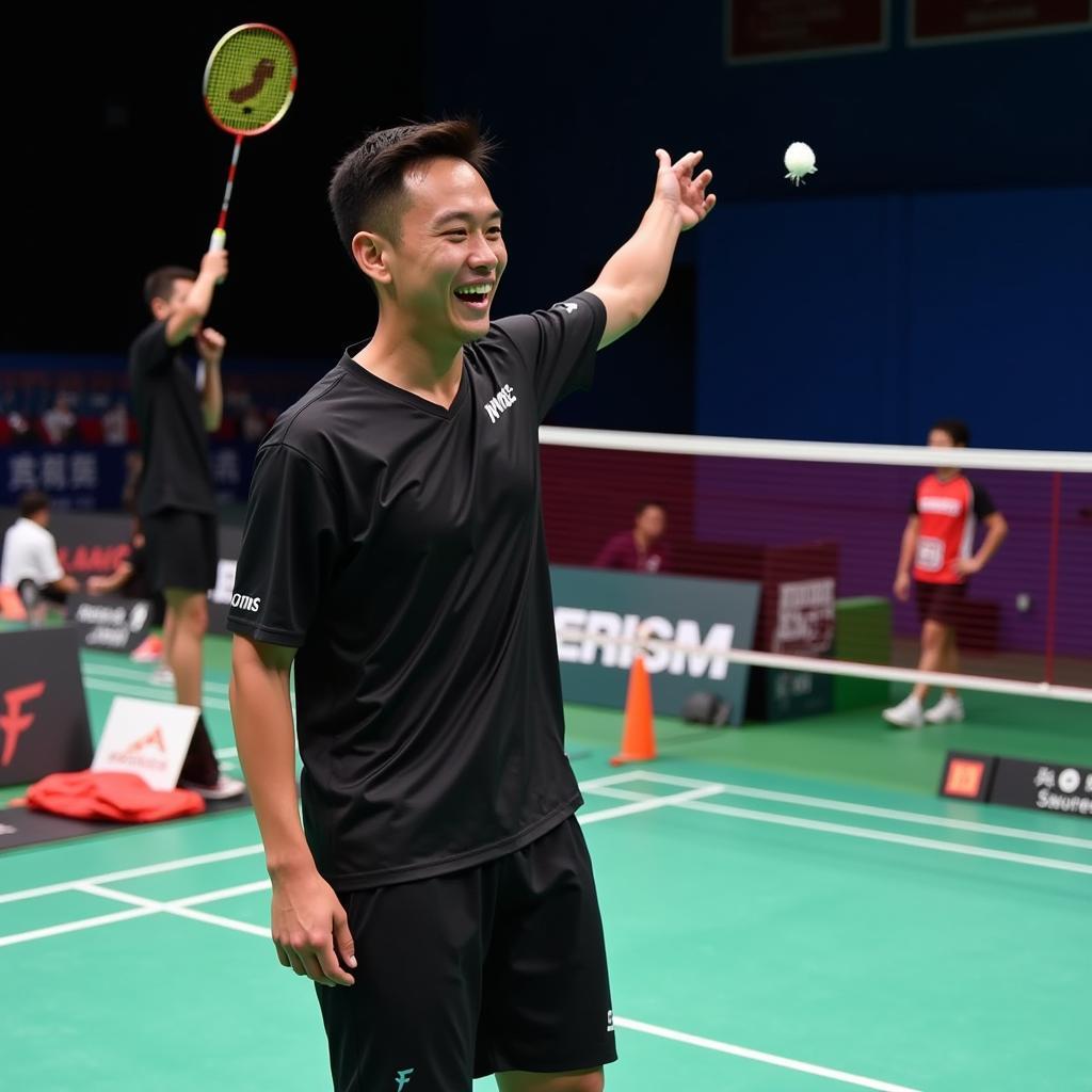 Badminton player celebrating a point