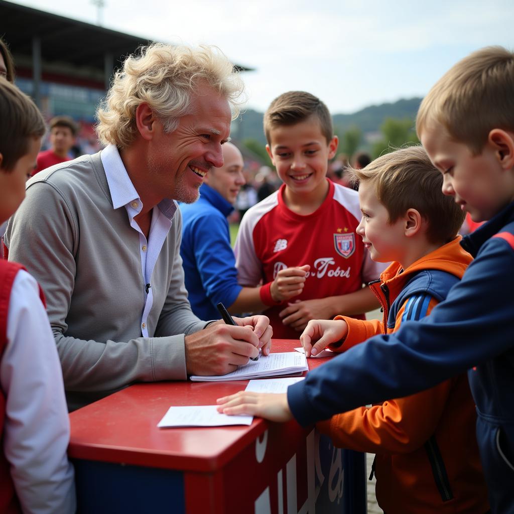 Erling Haaland signing autographs for fans