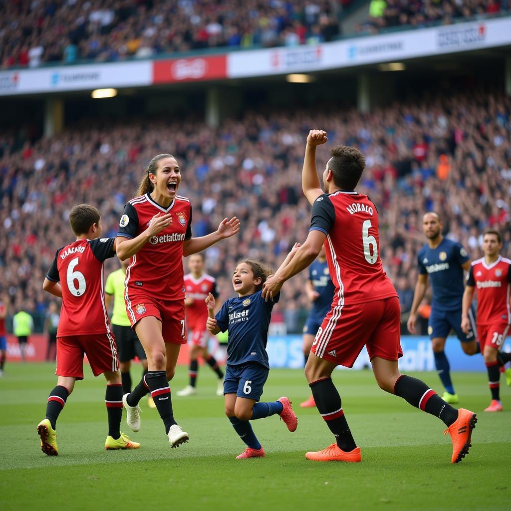 Football families celebrating a goal