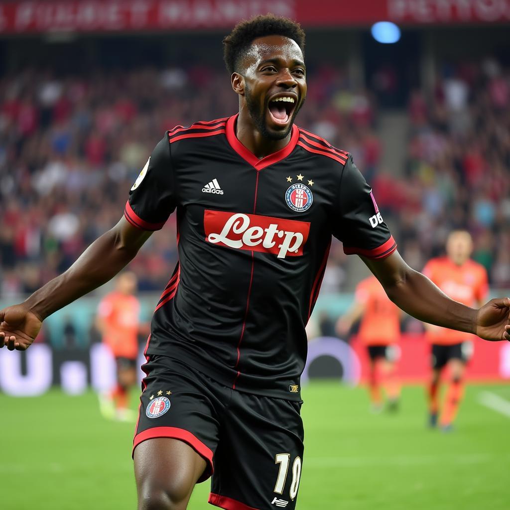 Amine Gouiri celebrating a goal for Nice