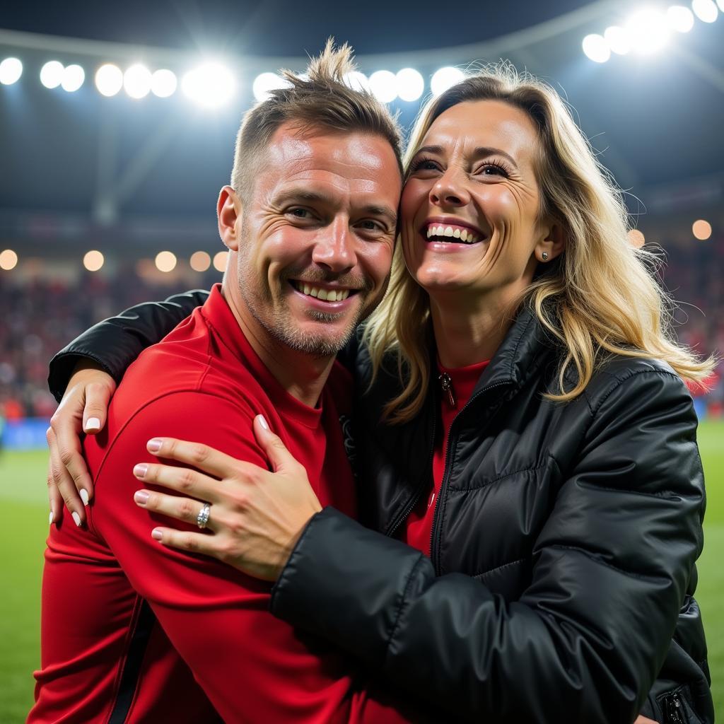 Gry Marita Braut and Erling Haaland celebrating a victory