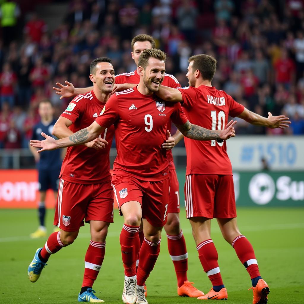 Haaland celebrating a goal with teammates