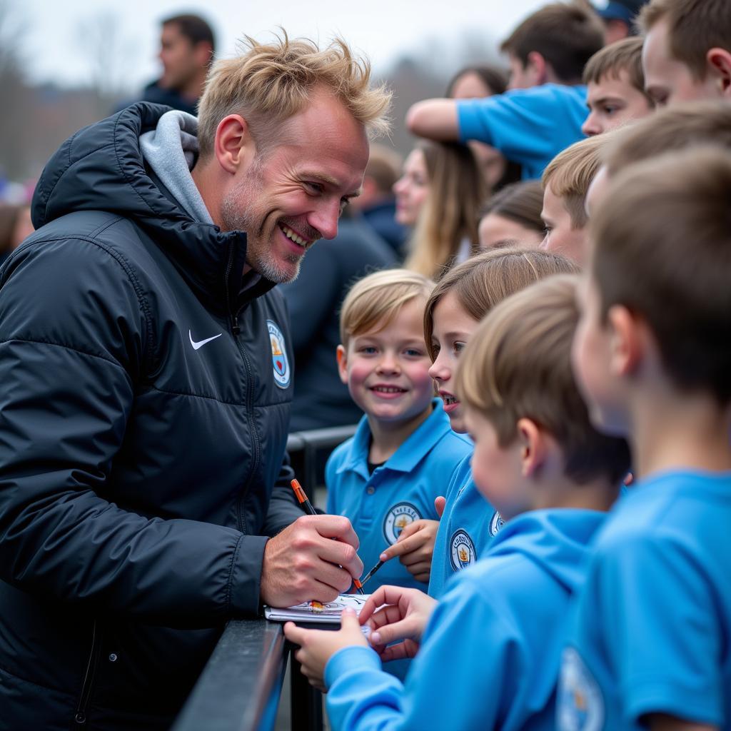 Haaland greeting young fans