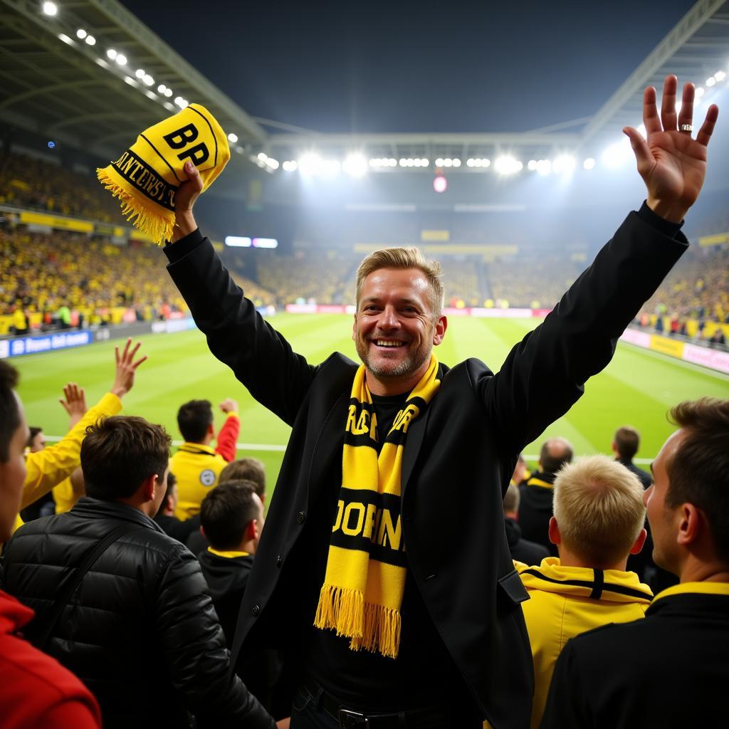 Haaland celebrating with Borussia Dortmund fans