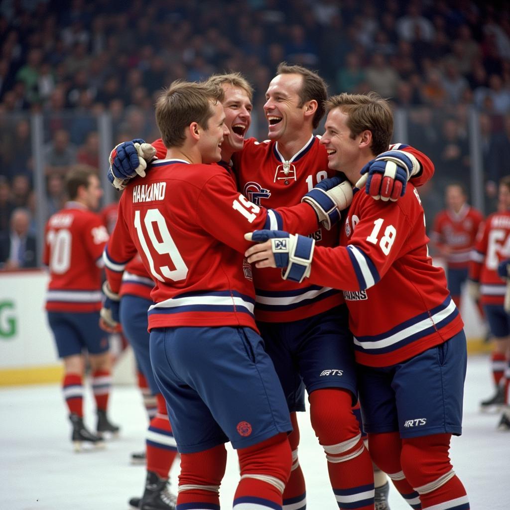 Erling Haaland embraces his teammates after scoring