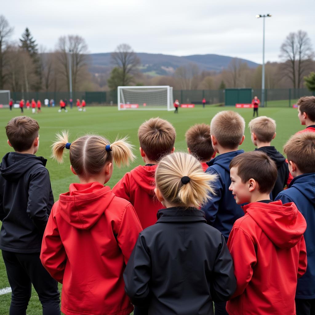 Young fans imitating Erling Haaland's hairstyle