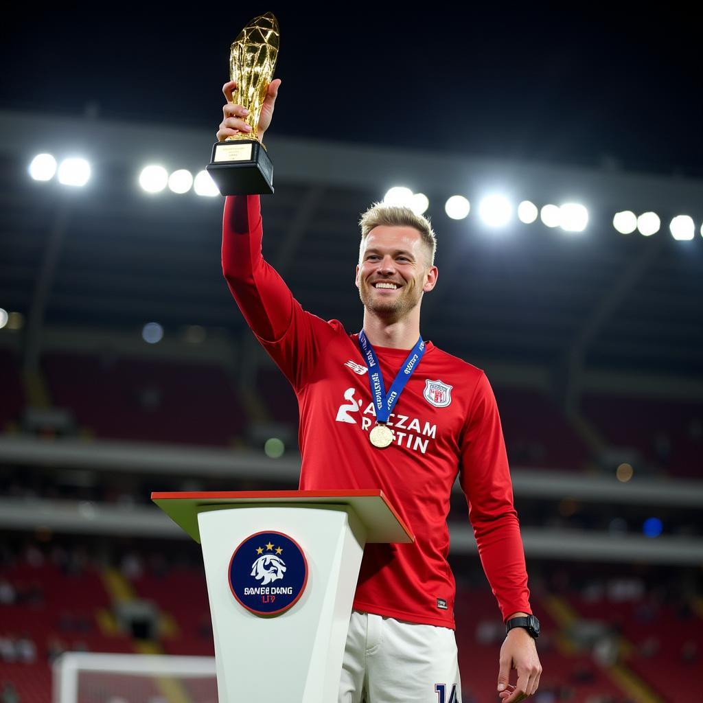 Haaland holding the Golden Boot award