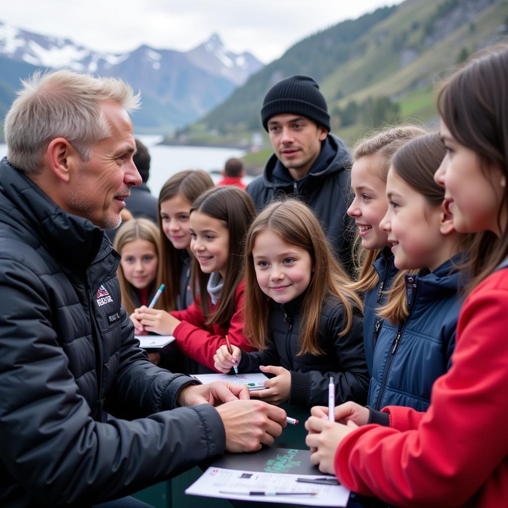 Erling Haaland interacting with young fans in Norway