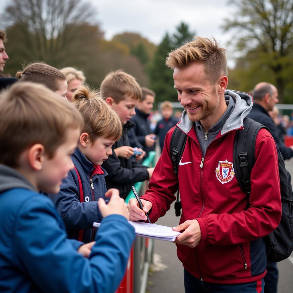 Erling Haaland interacting with young fans