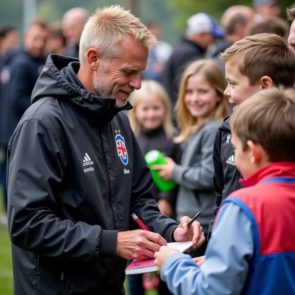  Erling Haaland interacting with young fans