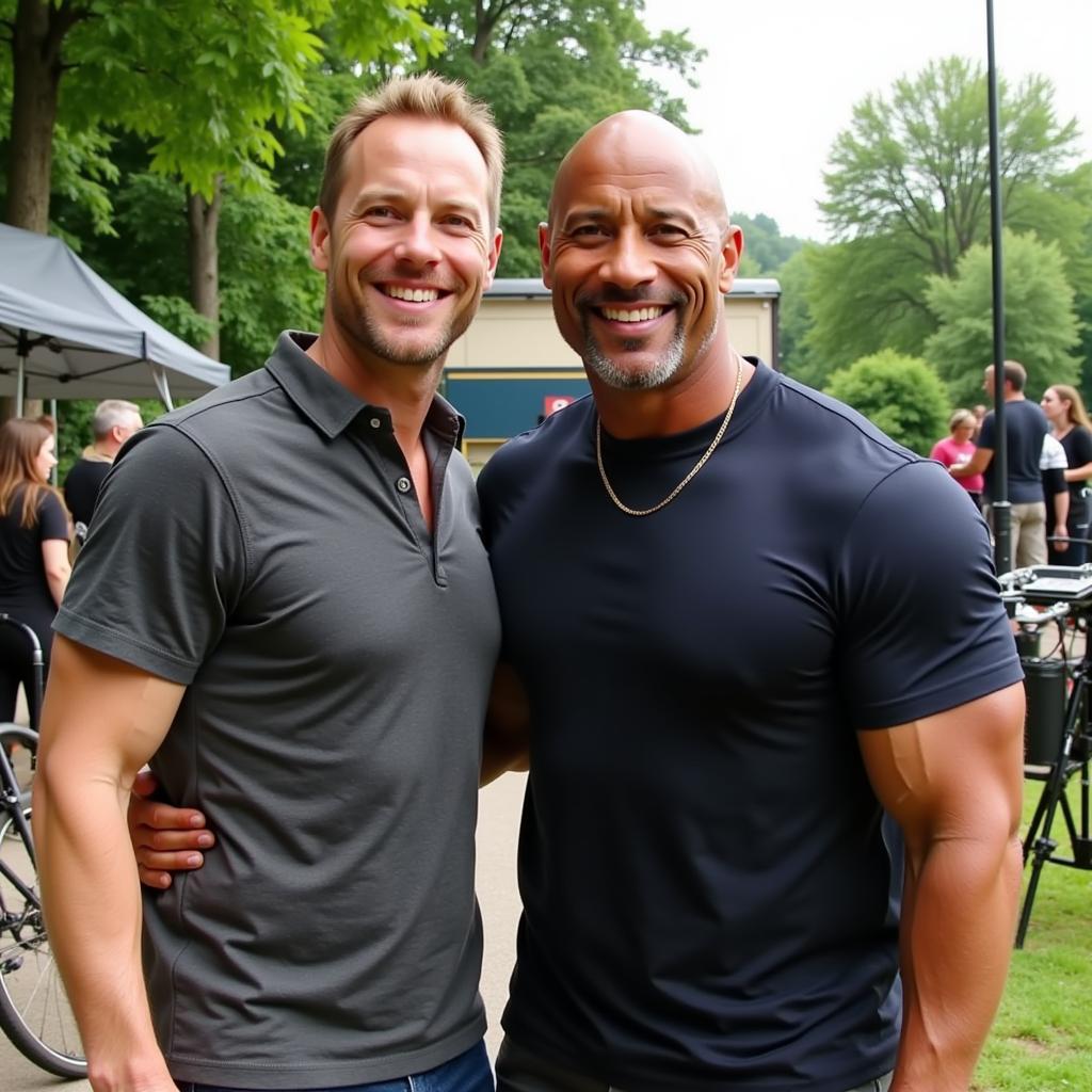 Erling Haaland and Dwayne Johnson posing together