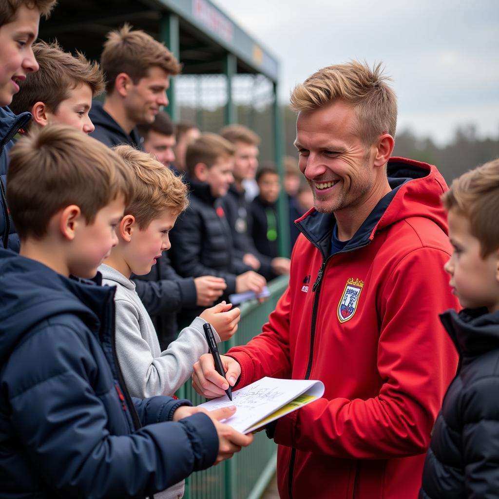 Haaland signing autographs for fans