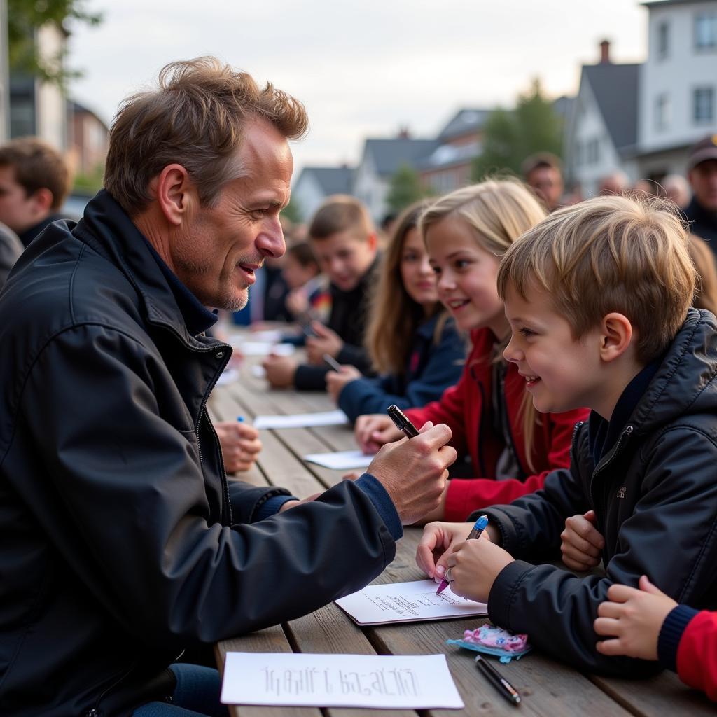 Erling Haaland signing autographs for young fans after a match