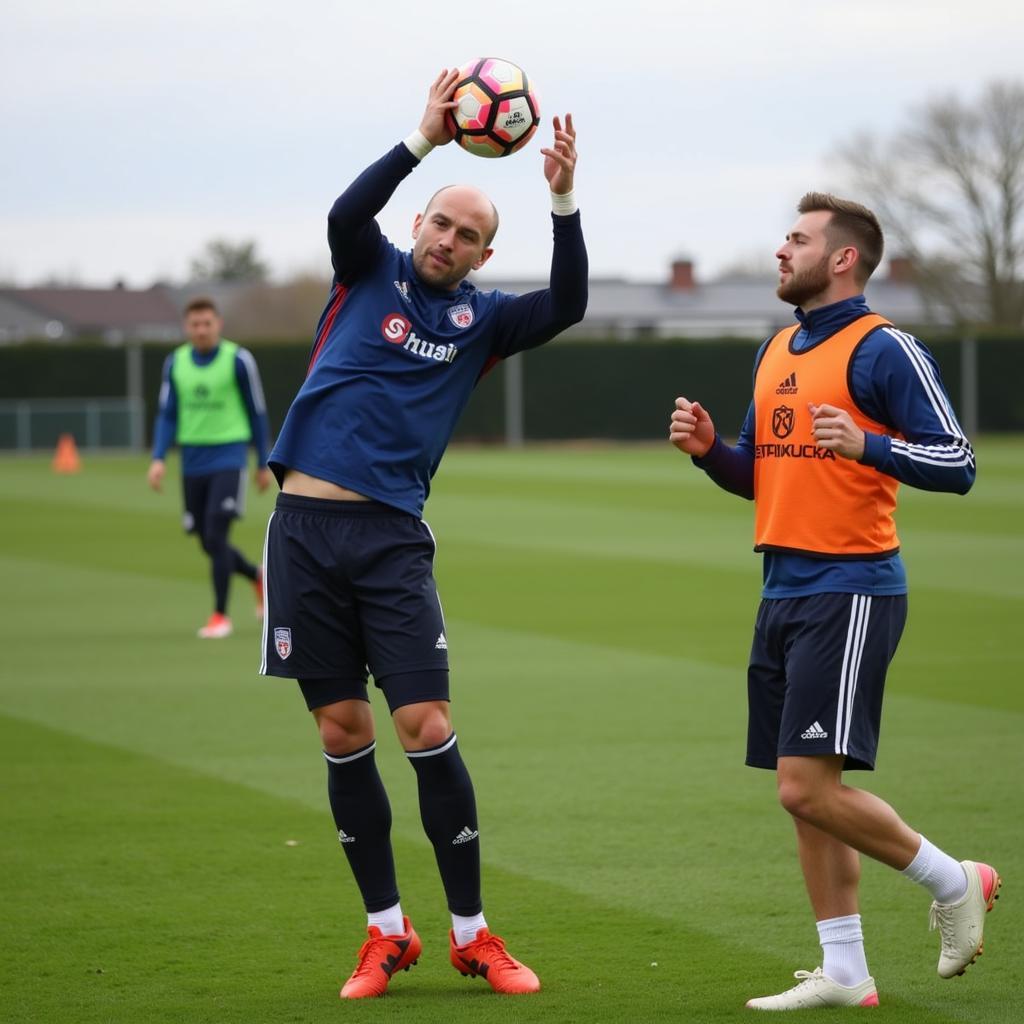 Haaland practices headers during a training session.