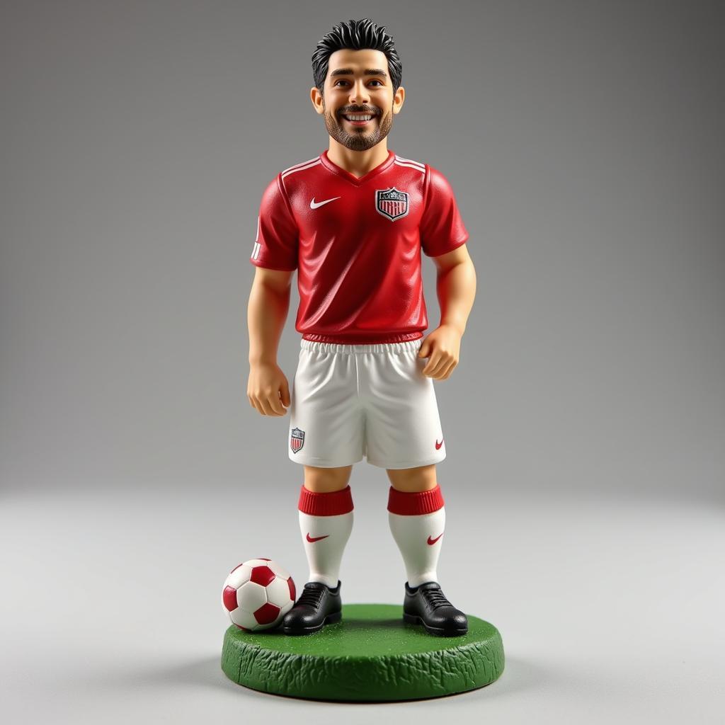 Miniature statue of a football player in iconic kit