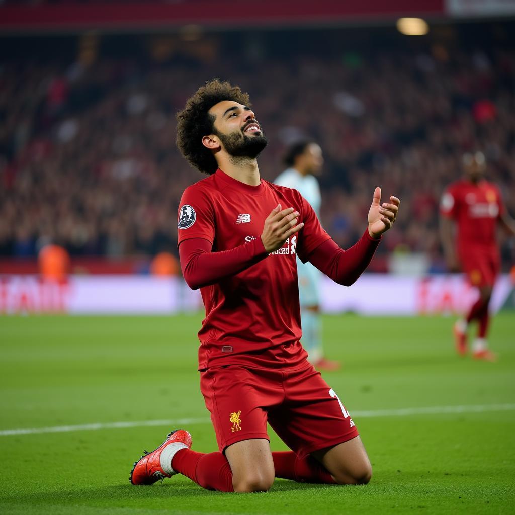 Mohamed Salah celebrating a goal with his signature pose