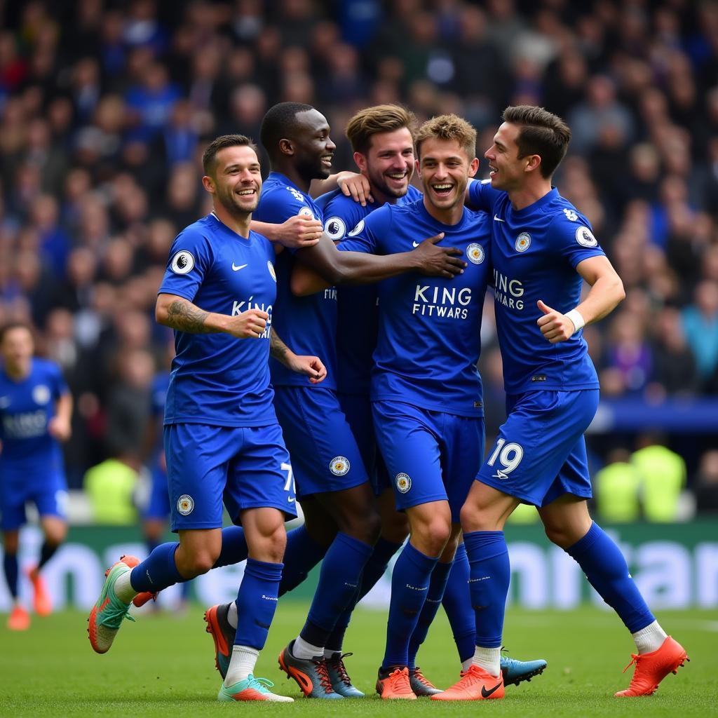 N'Golo Kanté celebrating a goal with Leicester City teammates.