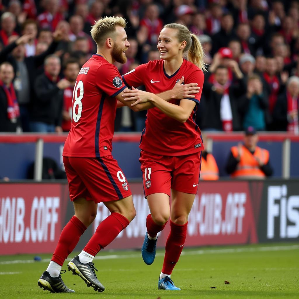 Ødegaard and Haaland celebrating a goal for Norway