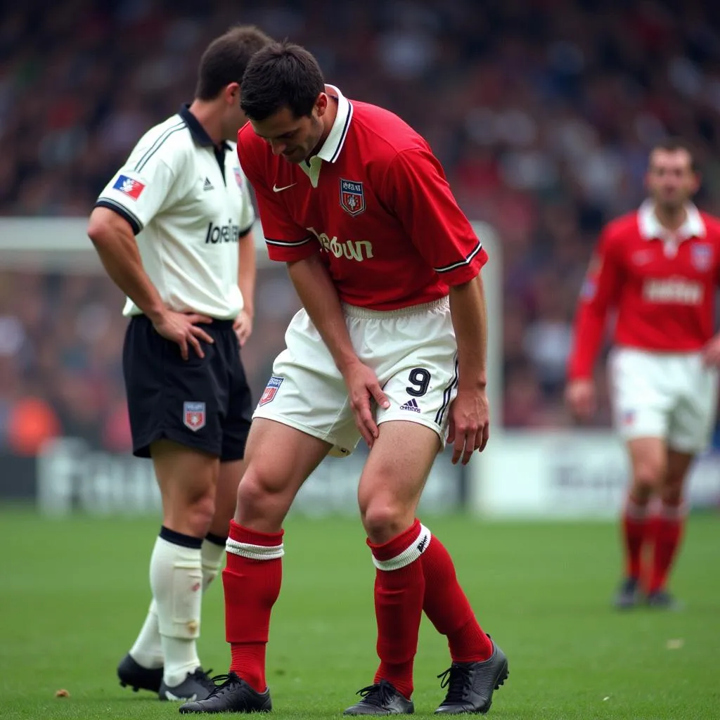 Roy Keane Suffering Injury in 1997