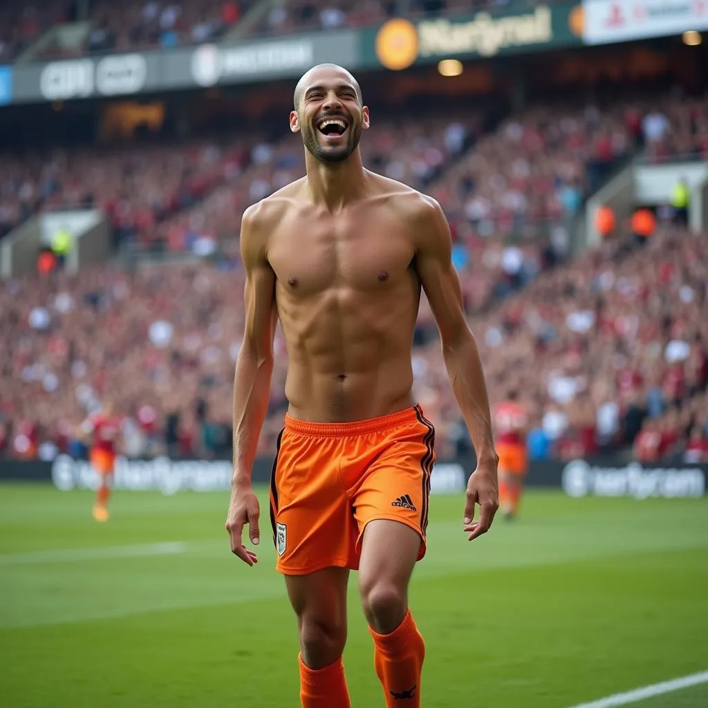  A slender football player with his arms raised in celebration after scoring a goal