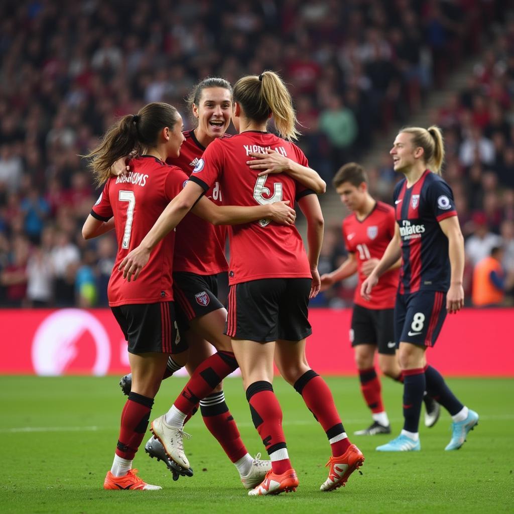 Team 4 players celebrating a goal