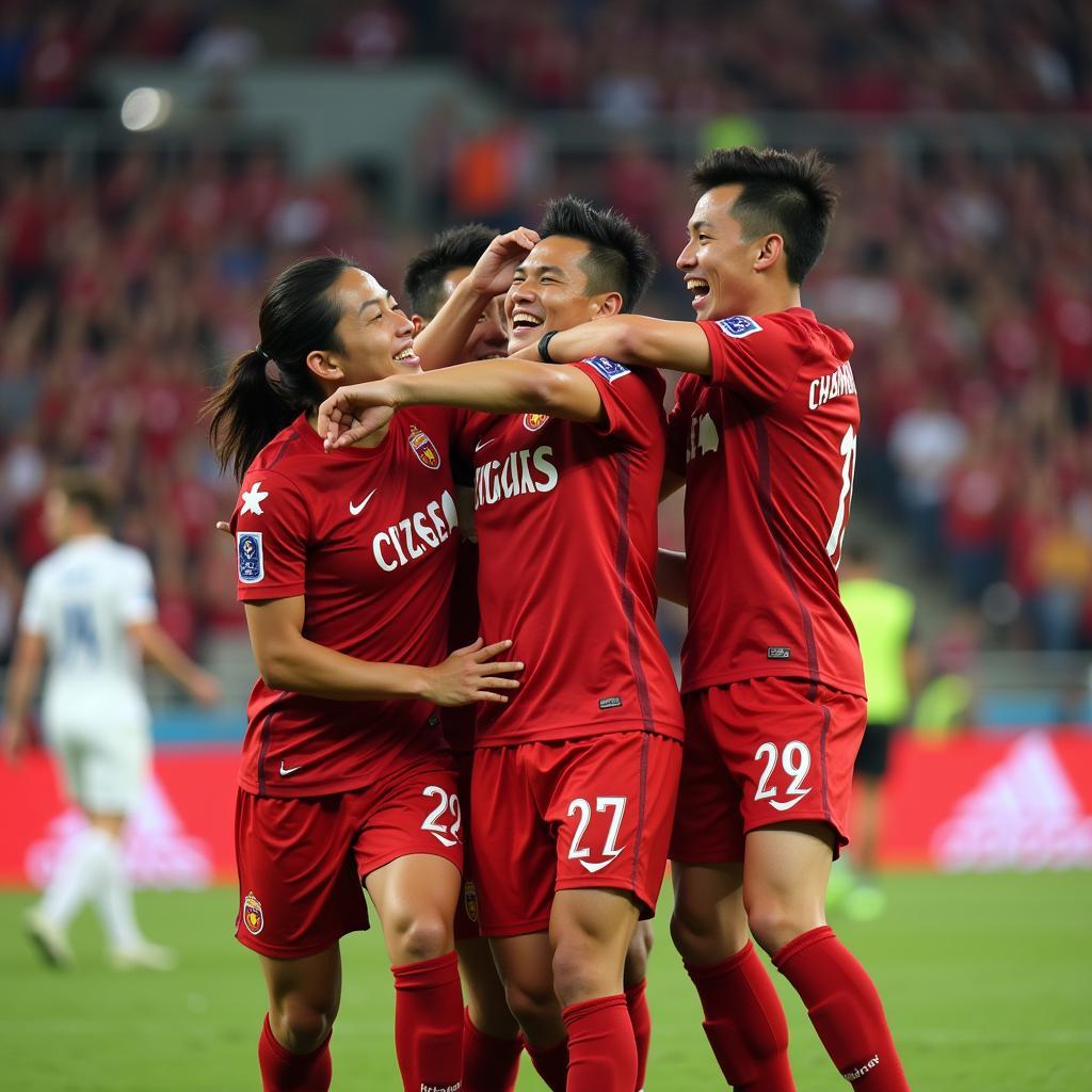 Tran Van Cuong celebrates a goal with his teammates