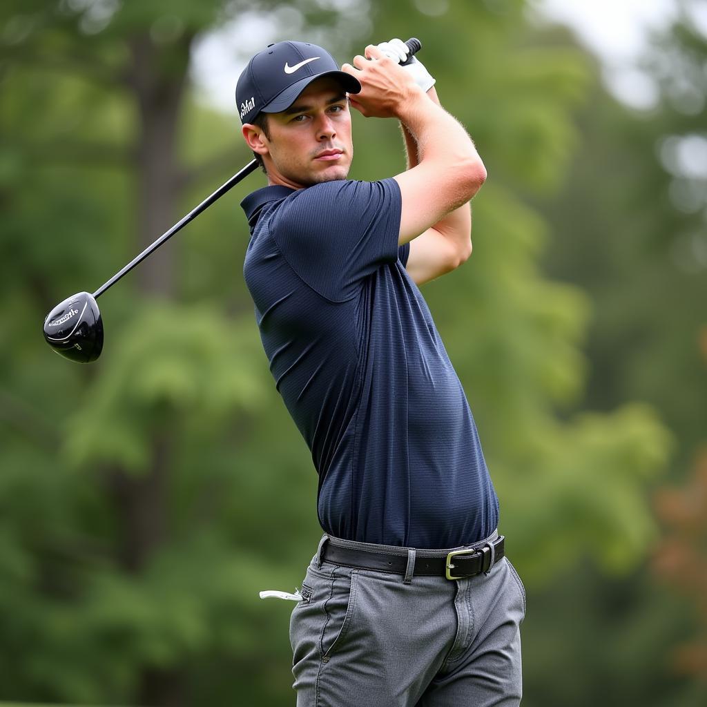 Viktor Hovland executes a golf swing