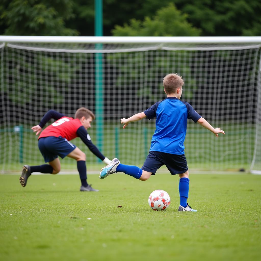  Young Football Player Scoring a Goal