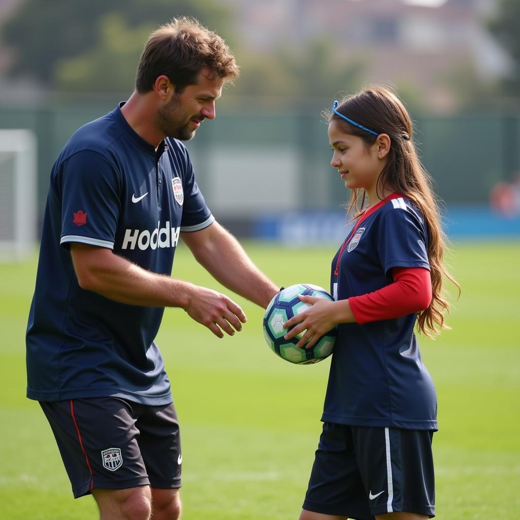 Coach Mentoring Young Footballer