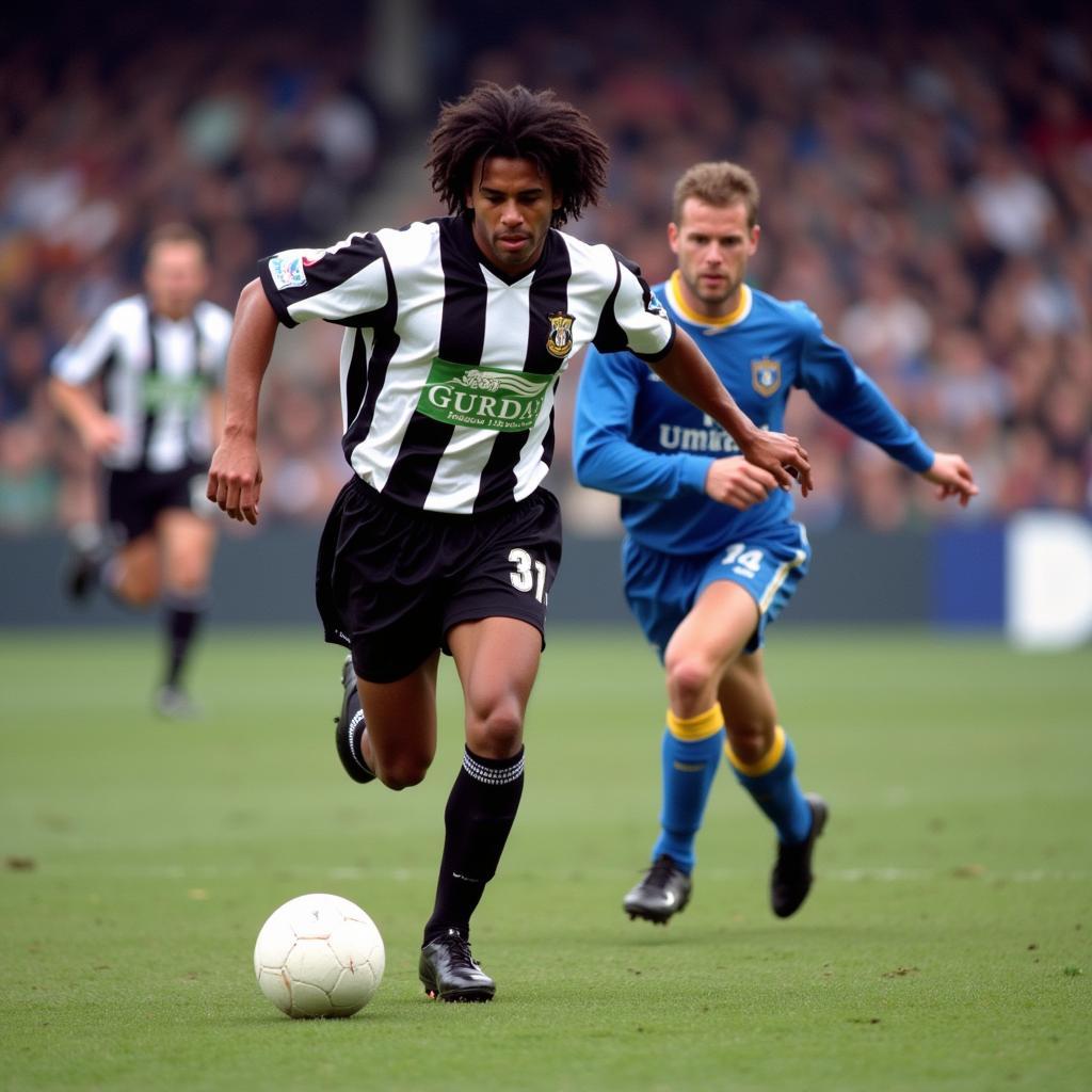 David Ginola playing for Newcastle United