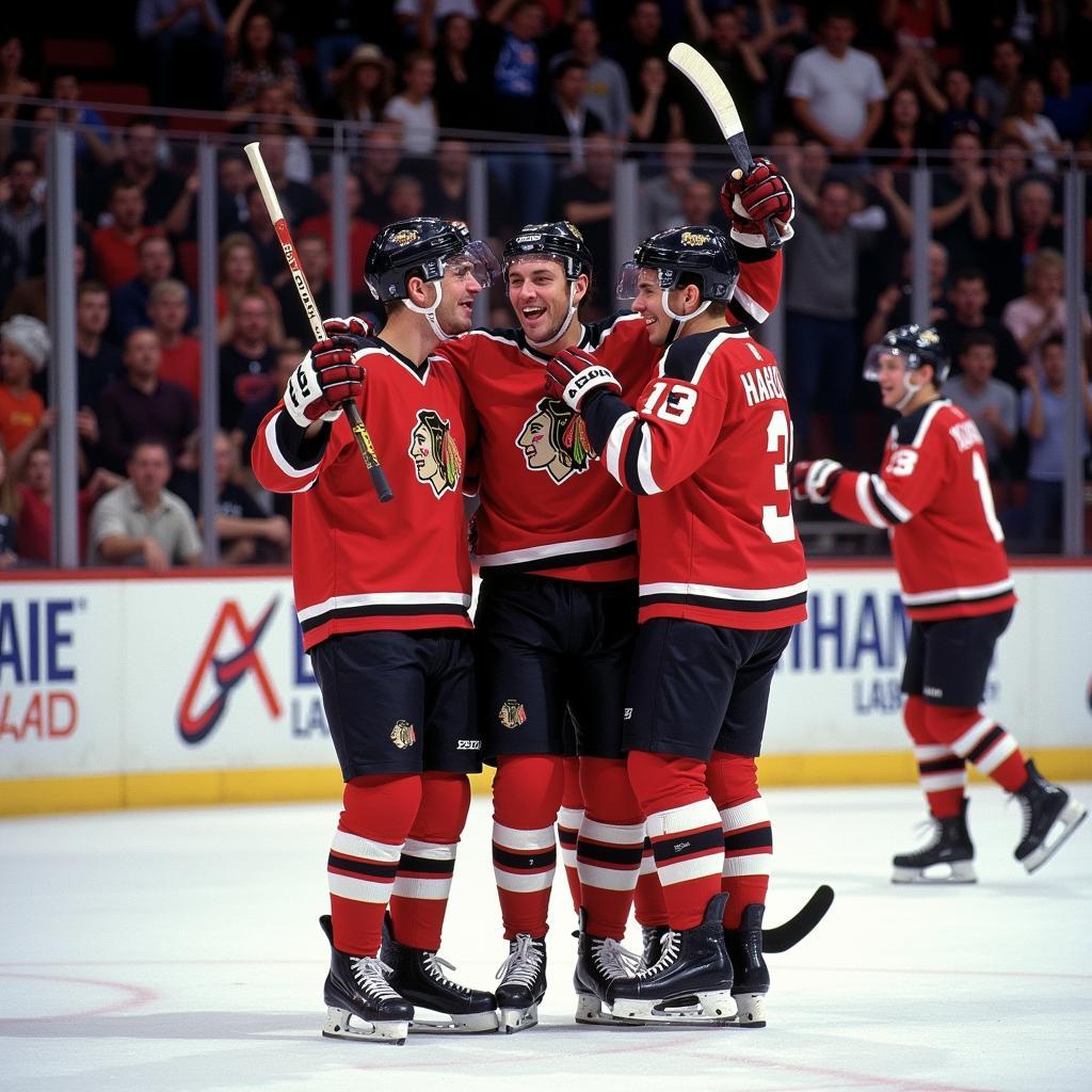 Egil Østenstad Haaland celebrating a goal with his teammates.