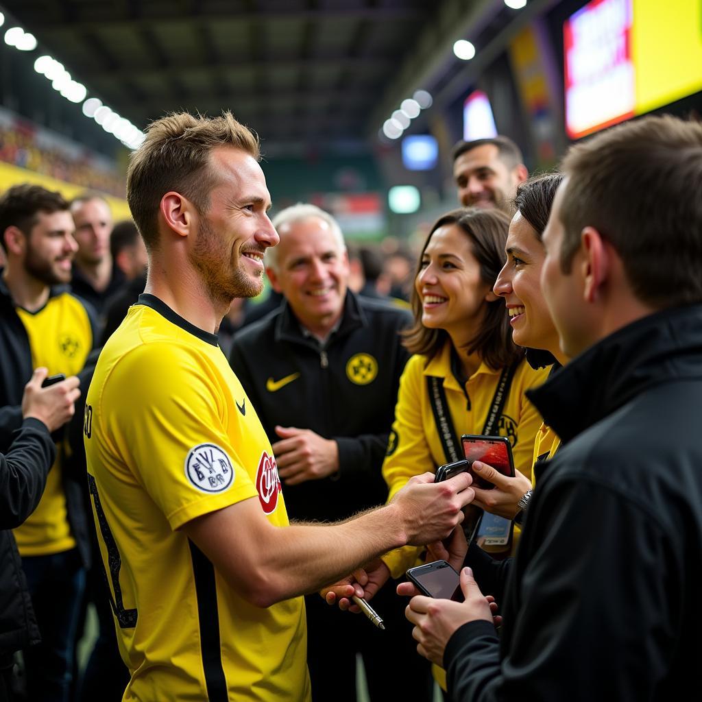 Haaland interacts with Dortmund fans