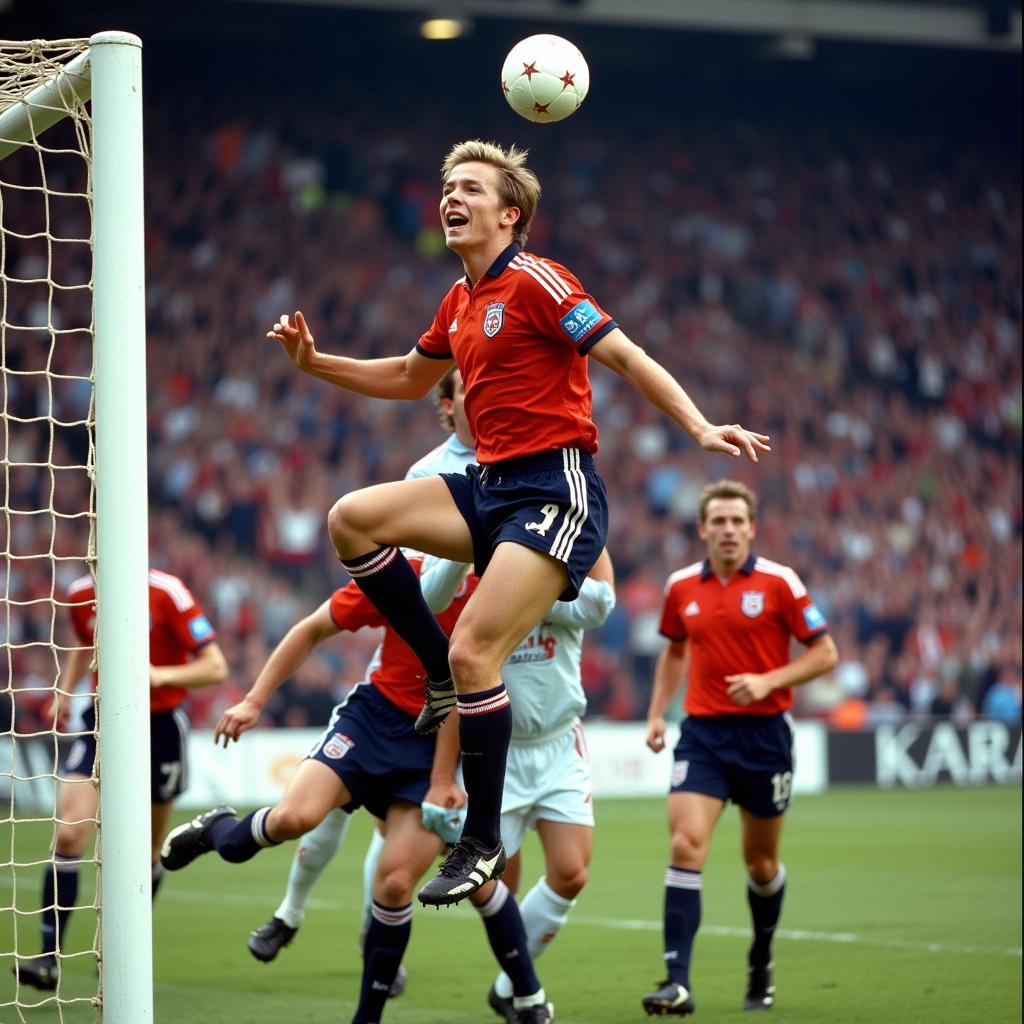 Erling Haaland celebrates after scoring a header goal