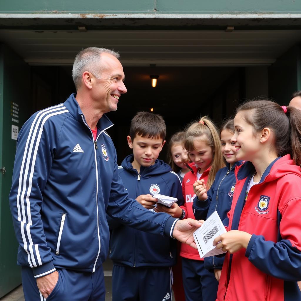 Erling Haaland interacts with young fans after a match