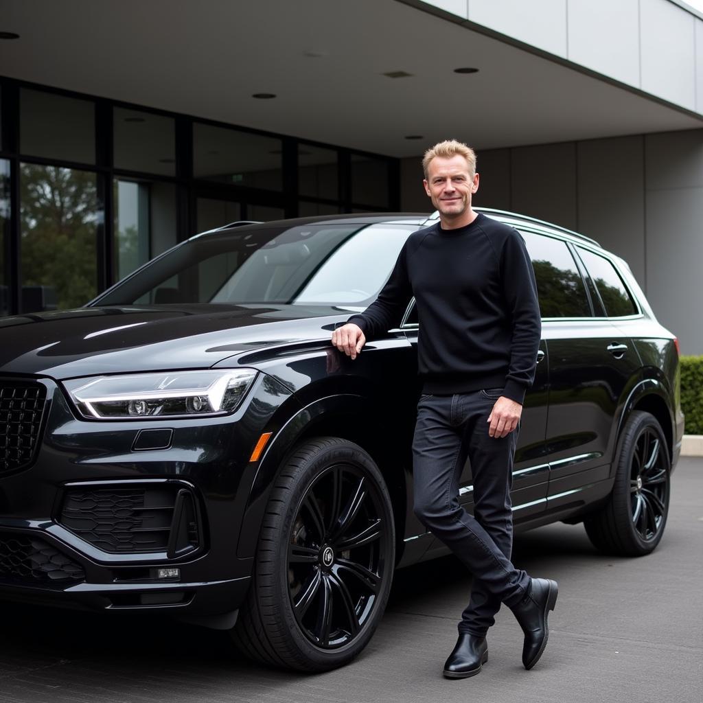 Erling Haaland posing with his new luxury SUV