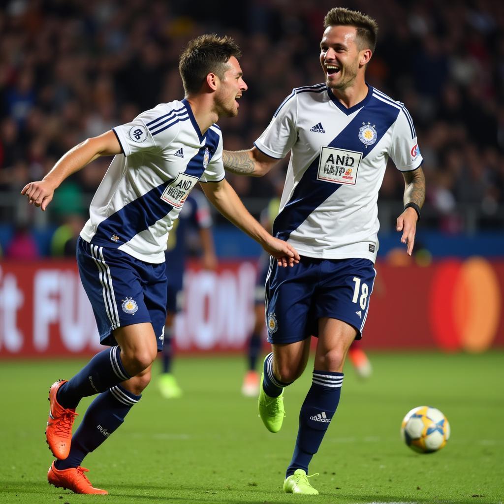 Haaland and Alvarez celebrating a goal together