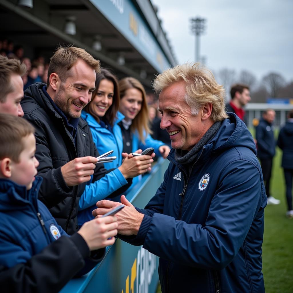 Erling Haaland celebrates with Manchester City fans after a victory.