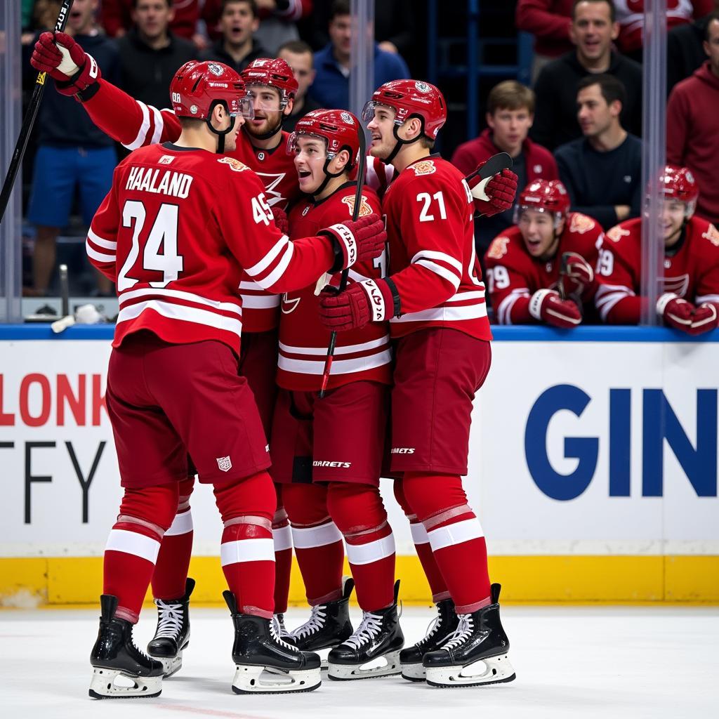 Erling Haaland celebrating a goal with his teammates