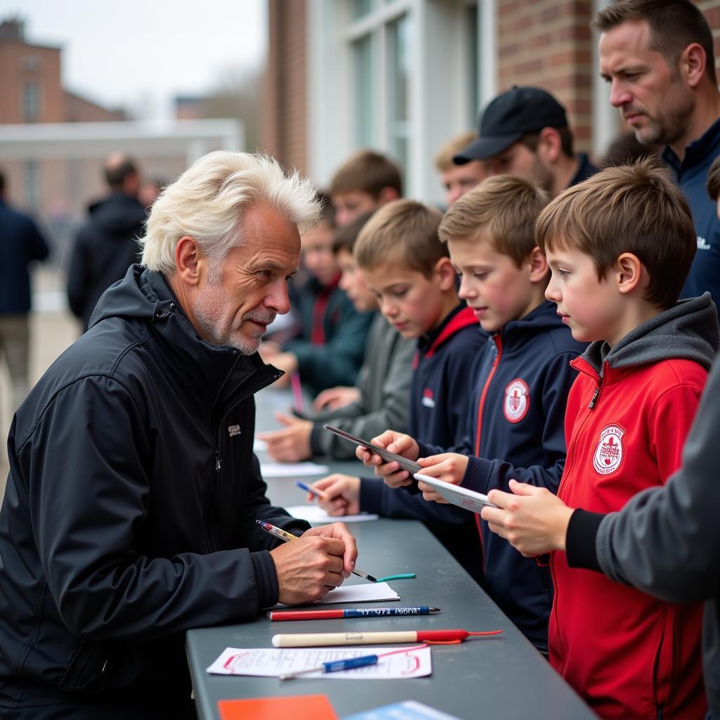 Erling Haaland interacting with young fans