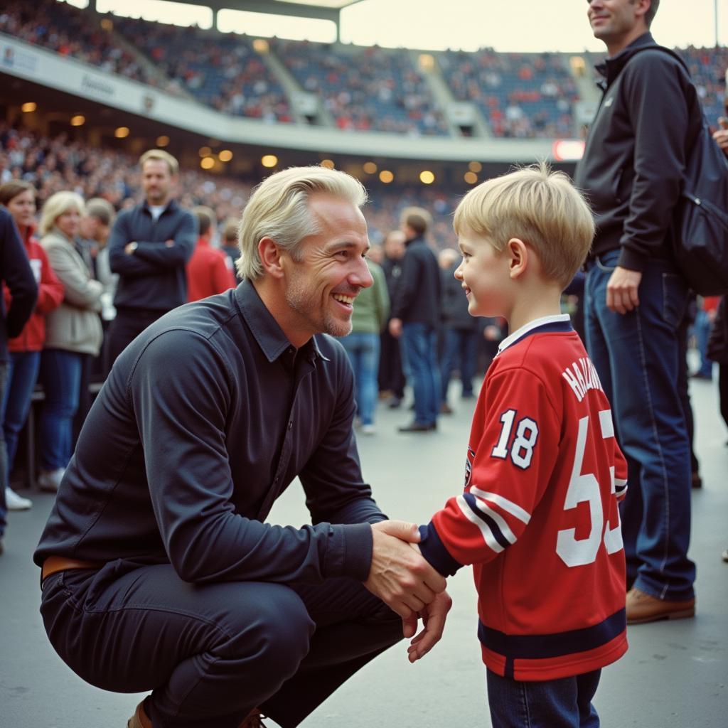 Erling Haaland interacting with a young fan