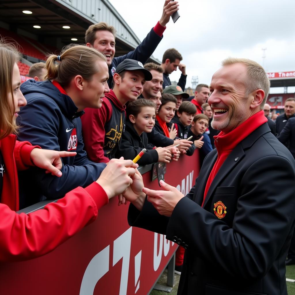 Haaland interacting with Man United fans at Old Trafford