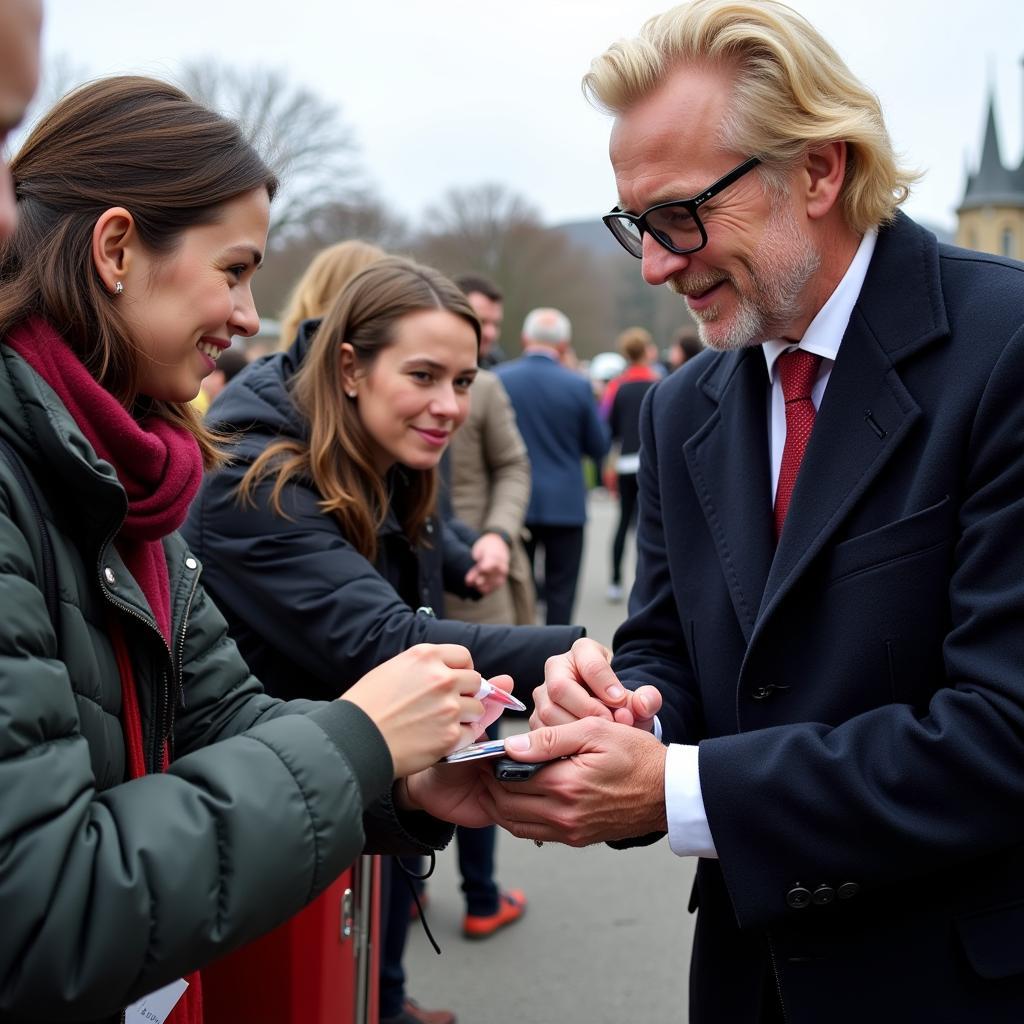 Haaland Signs Autographs for Fans