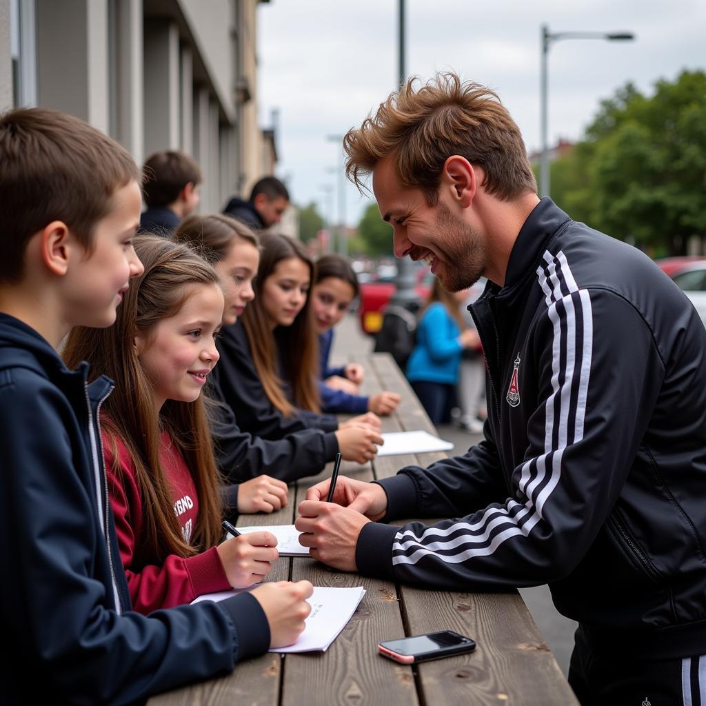 Haaland signing autographs for young fans