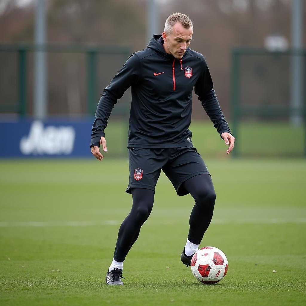 Erling Haaland training intensely with a football