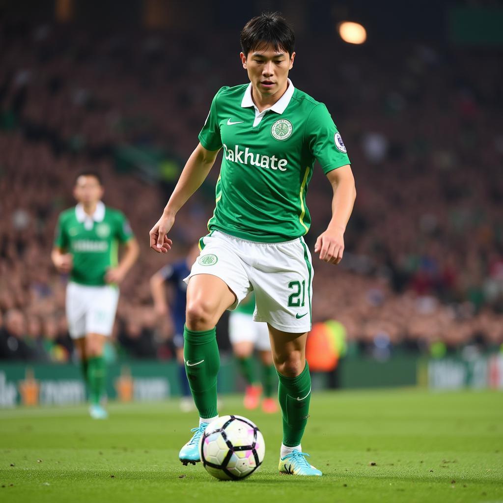 Ki Sung-yueng orchestrating Celtic's midfield during a crucial match.