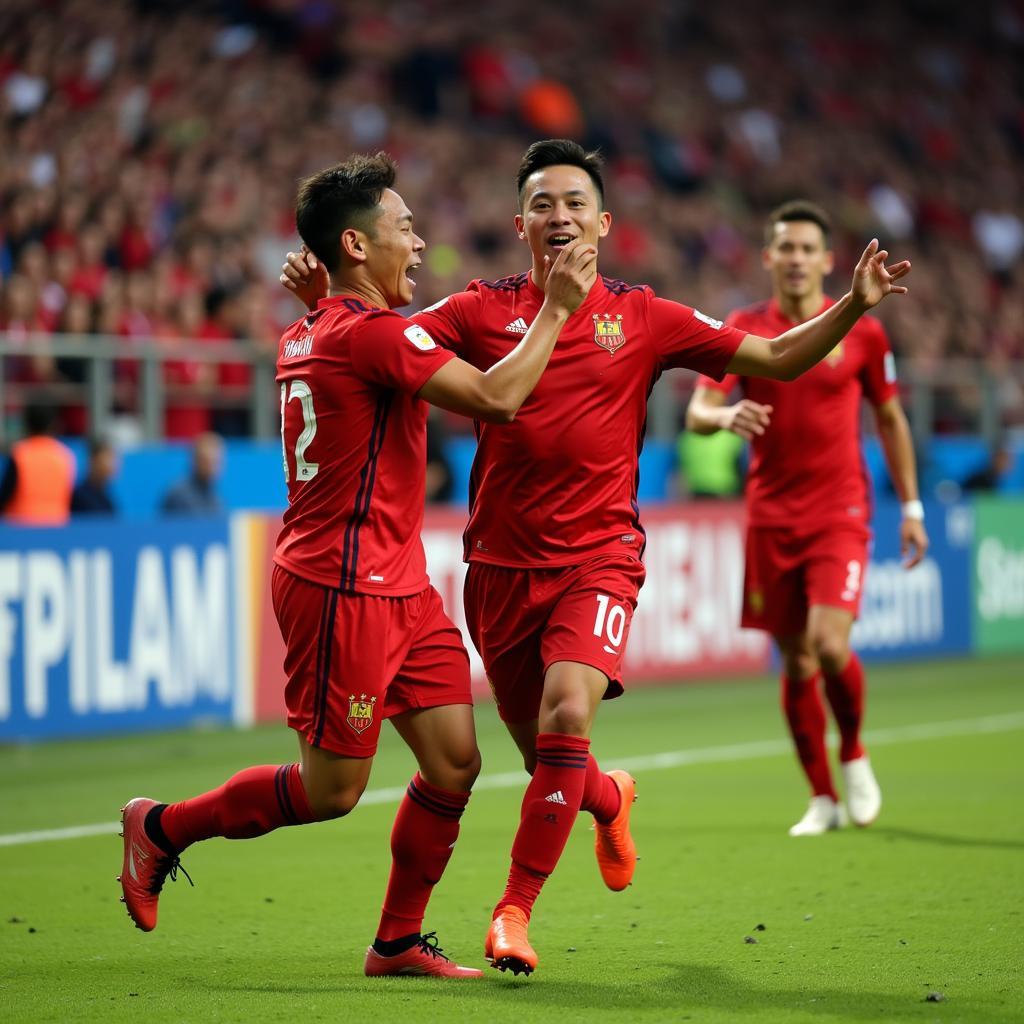 Minh Hai celebrating a goal with teammates