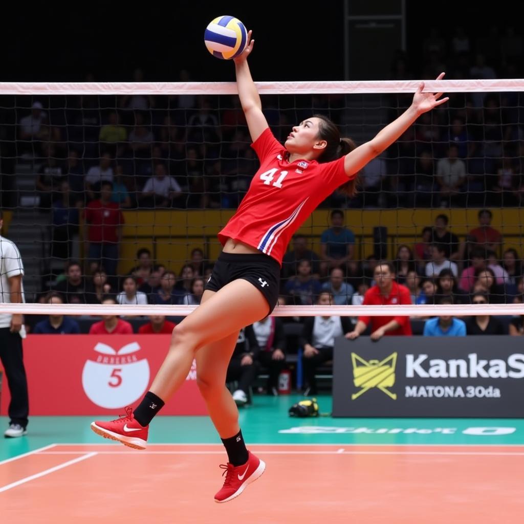 Nguyen Thi Xuan executing a powerful spike during a volleyball match