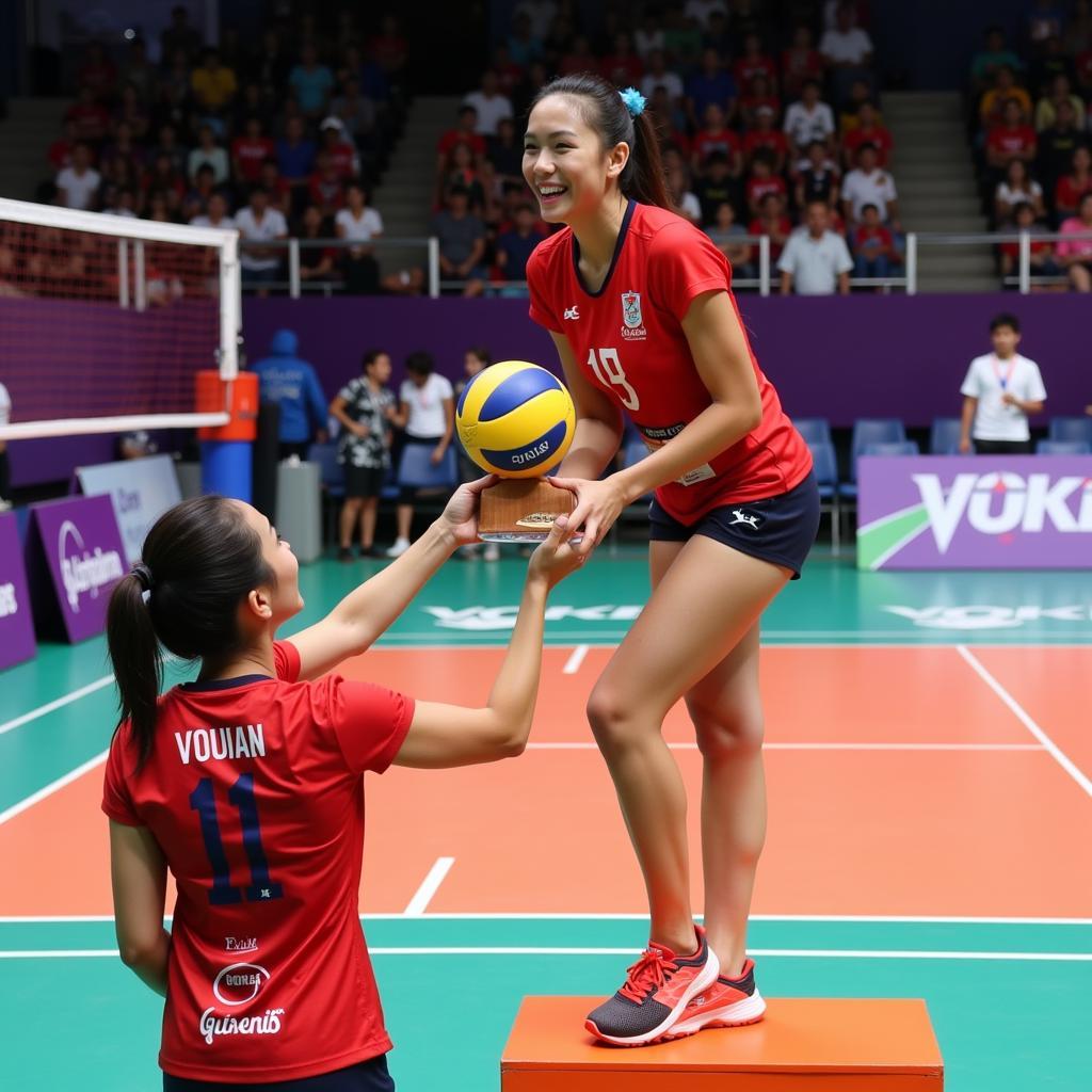 Nguyen Thi Xuan receiving an award for her outstanding performance in volleyball