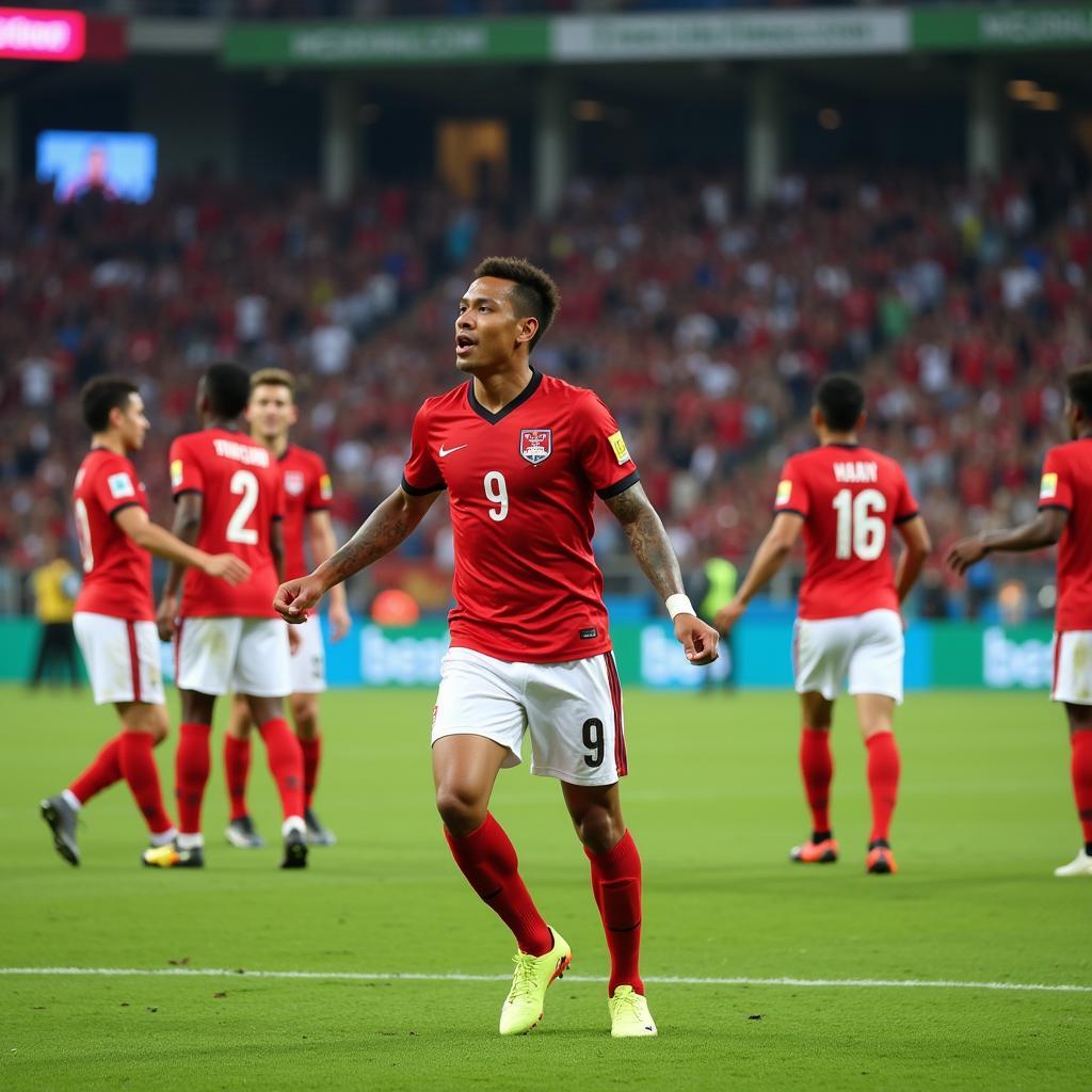 Osvaldo Haay celebrates a goal at the 30th SEA Games.